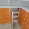 Фото №18368 Аптечні меблі в білому і помаранчовому Меблі з фасадом ДСП