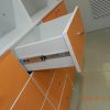 Фото №18369 Аптечная мебель в белом и оранжевом ДСП