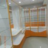 Фото №18361 Аптечні меблі в білому і помаранчовому ДСП
